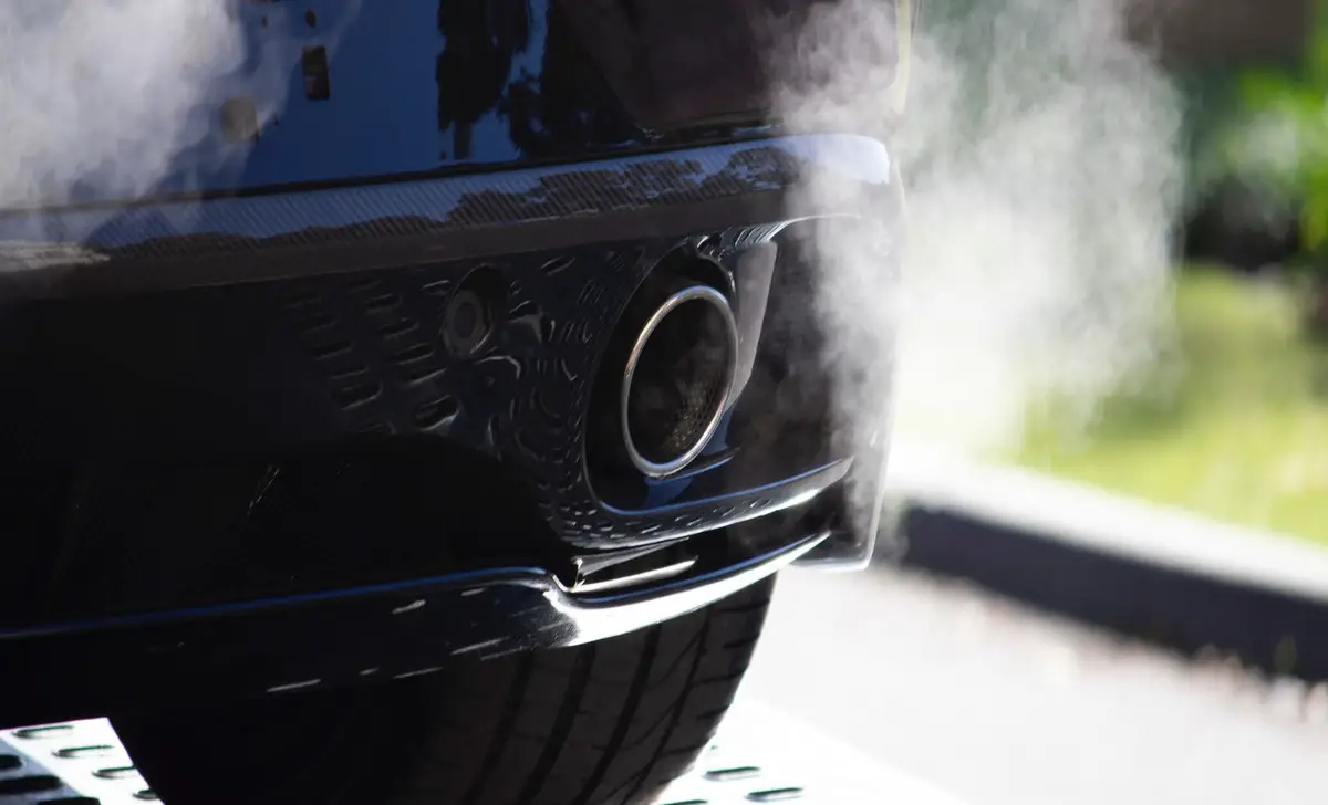 Smoke Or Flames Shoot Out Of Your Exhaust When You Start The Car